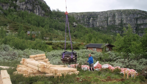 Shipping a log house by helicopter in Norway