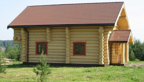 Painting a wooden house